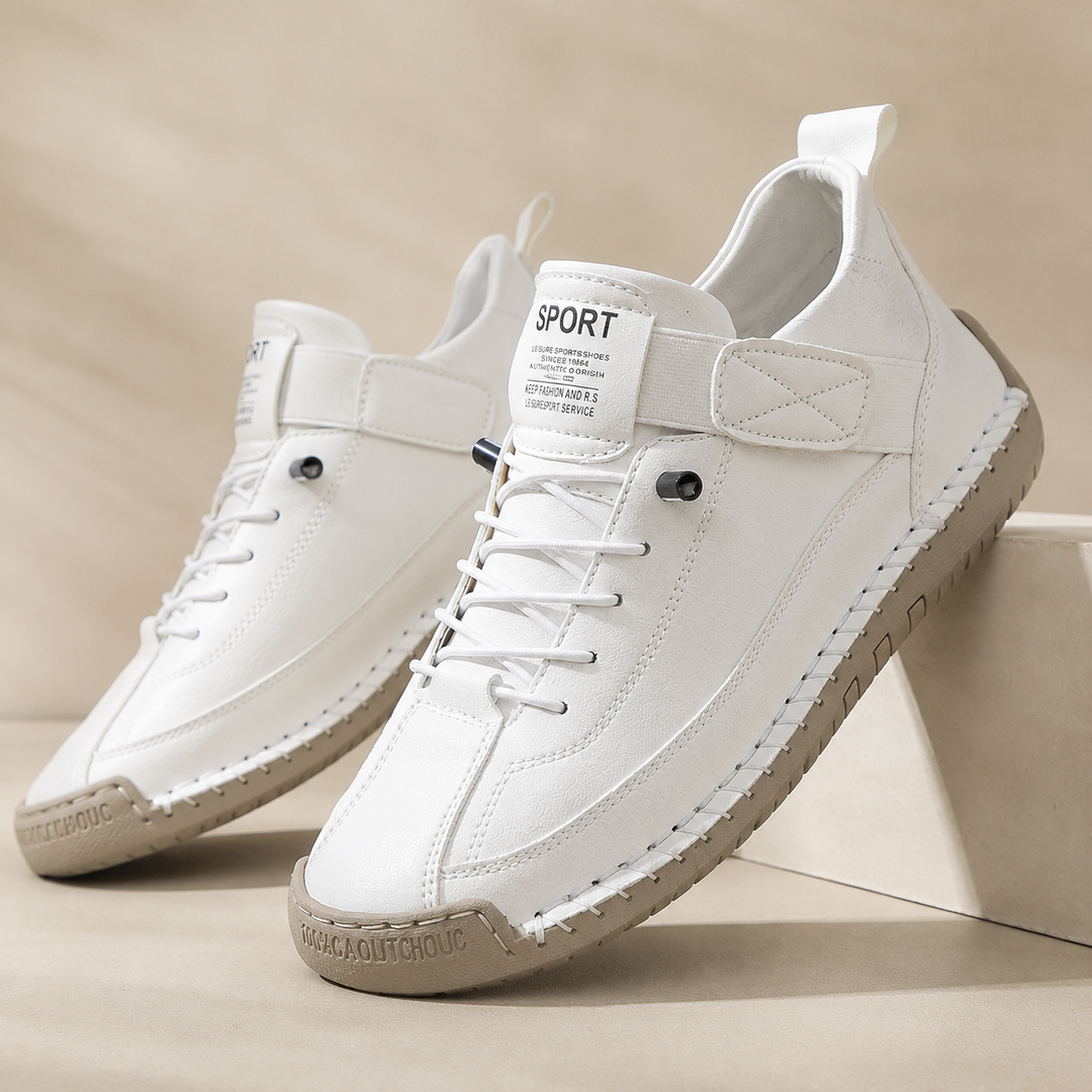 Low-top lace-up trainers with stitched panels, rounded toes and flat textured soles