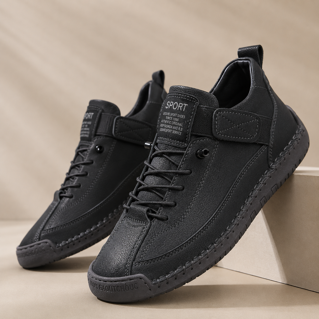 Low-top lace-up trainers with stitched panels, rounded toes and flat textured soles