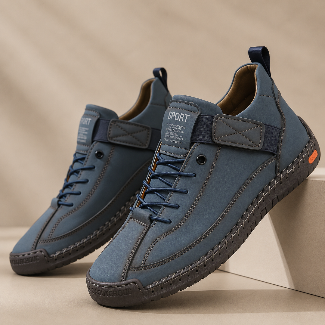 Low-top lace-up trainers with stitched panels, rounded toes and flat textured soles