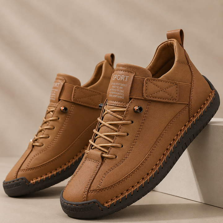 Low-top lace-up trainers with stitched panels, rounded toes and flat textured soles