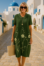 Women's floral V-neck shift dress with short sleeves and knee-length hem