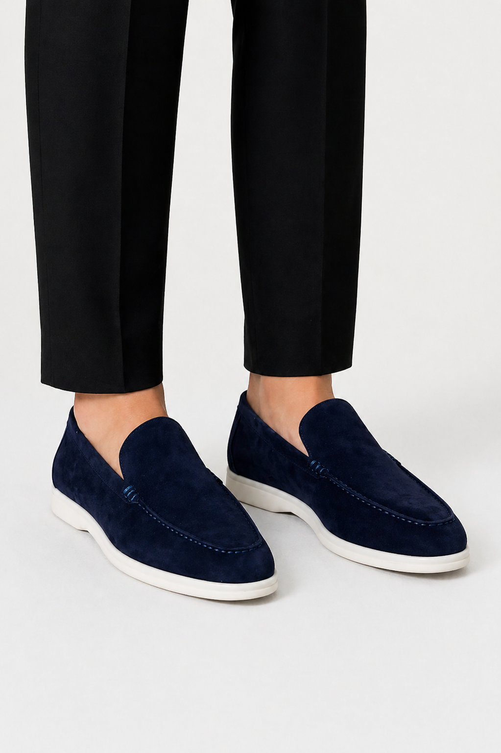 Men's slip-on loafers with moc toe stitching and low white soles