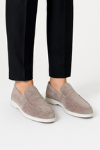 Men's slip-on loafers with moc toe stitching and low white soles