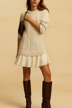 Women's cable knit mini dress with long sleeves and pleated lower skirt