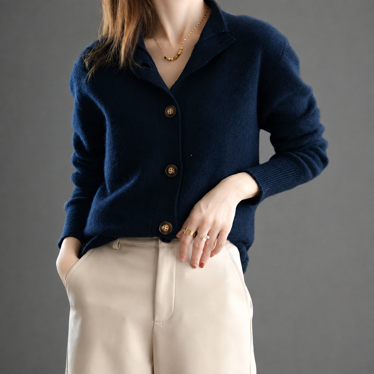 Women's button front cardigan with stand collar and ribbed cuffs