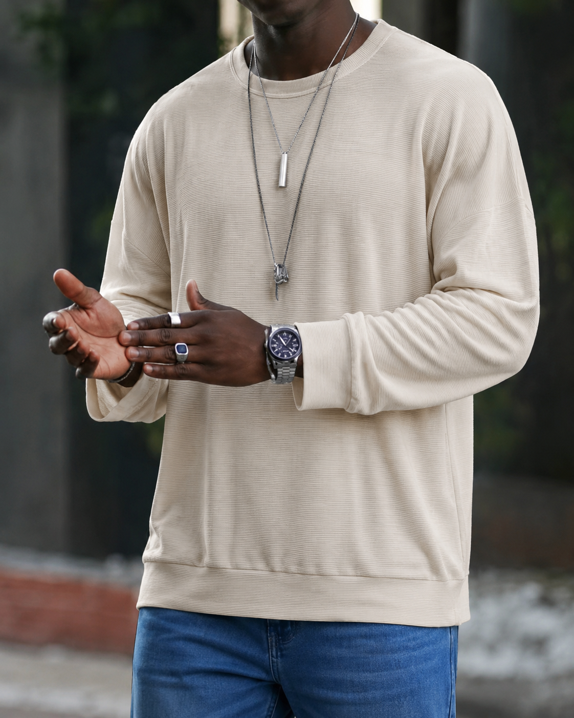 Men's textured knit sweater with crew neckline and long sleeves