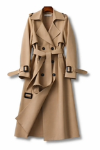 Women's long belted double-breasted trench coat with wide collar and cuff straps