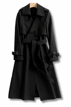 Women's long belted double-breasted trench coat with wide collar and cuff straps