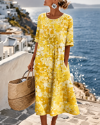 Women's multicoloured floral midi dress with round neckline and three-quarter sleeves