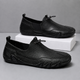 Men's slip-on moccasin loafers with toggle lace detail and flat segmented soles