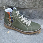 Women's high top lace-up sneakers with contrast stitching