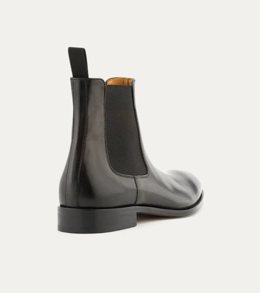 Black Chelsea boot with elastic side panel and low heel