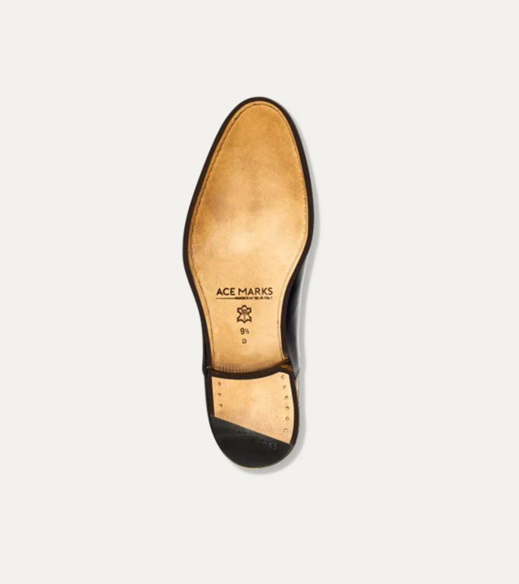 Black Chelsea boot with elastic side panel and low heel