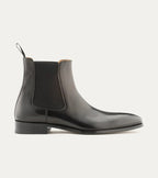 Black Chelsea boot with elastic side panel and low heel