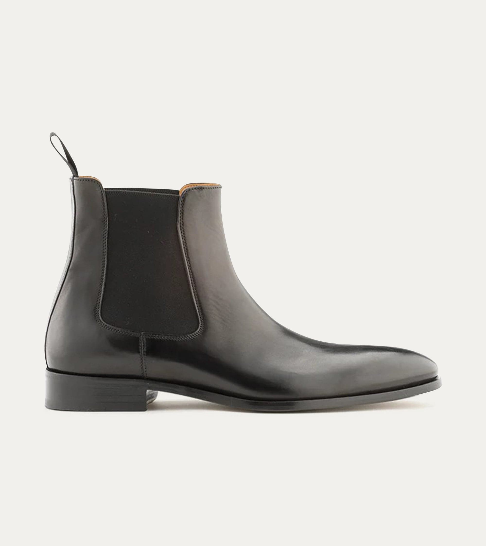 Black Chelsea boot with elastic side panel and low heel