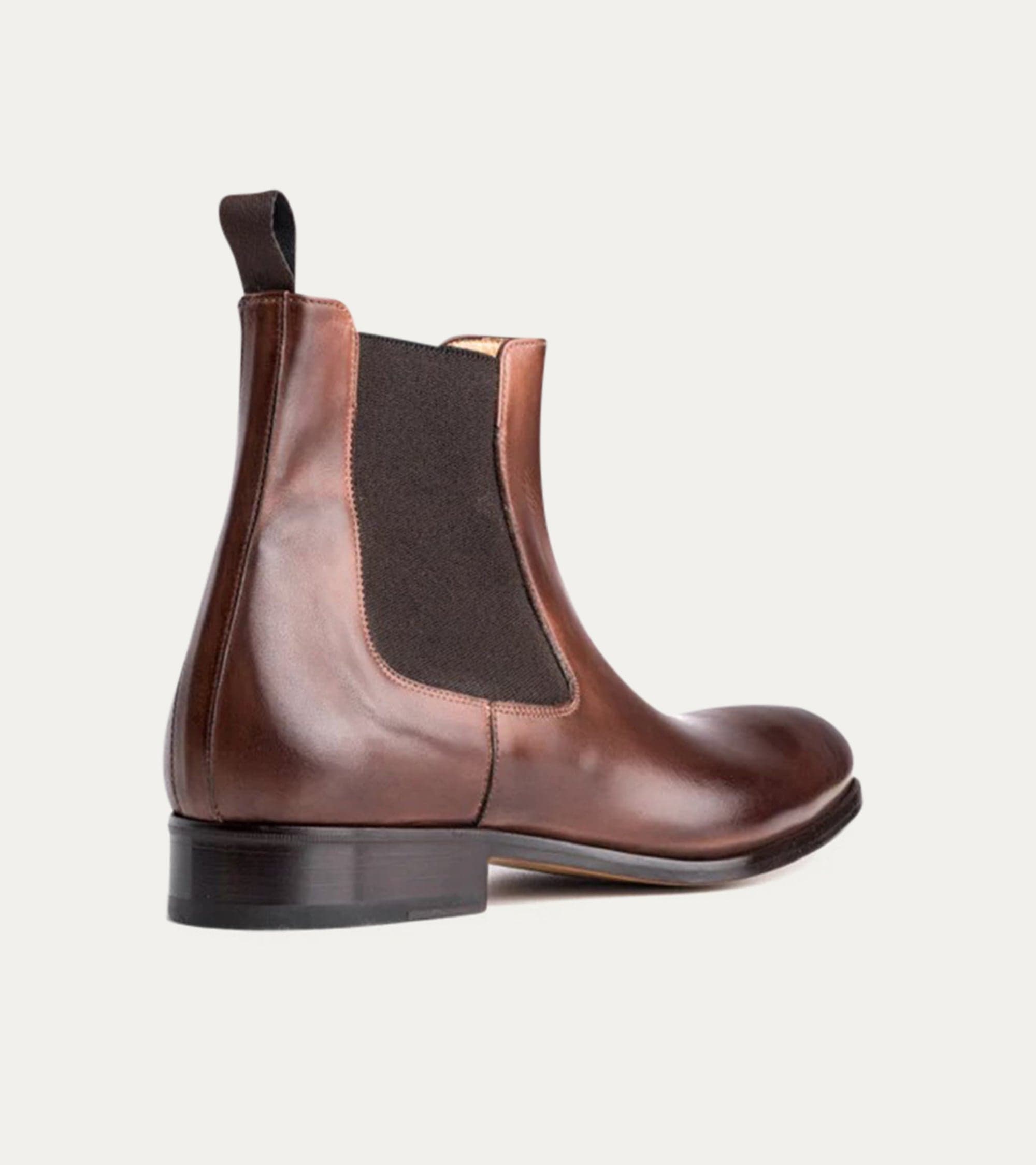 Men's polished brown Chelsea ankle boot with elastic side panels and low heel
