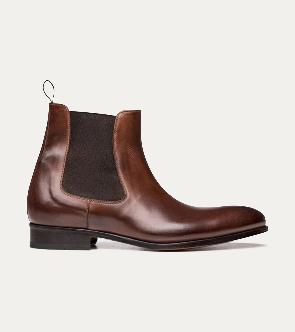 Men's polished brown Chelsea ankle boot with elastic side panels and low heel