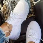 Women's knit-texture walking sneakers with lace-up fronts