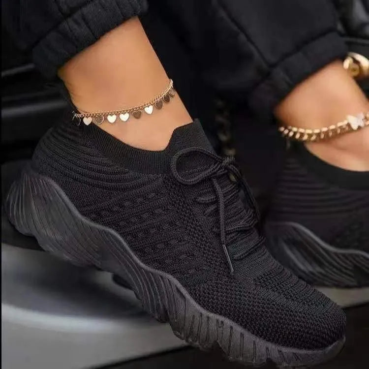 Women's knit-texture walking sneakers with lace-up fronts
