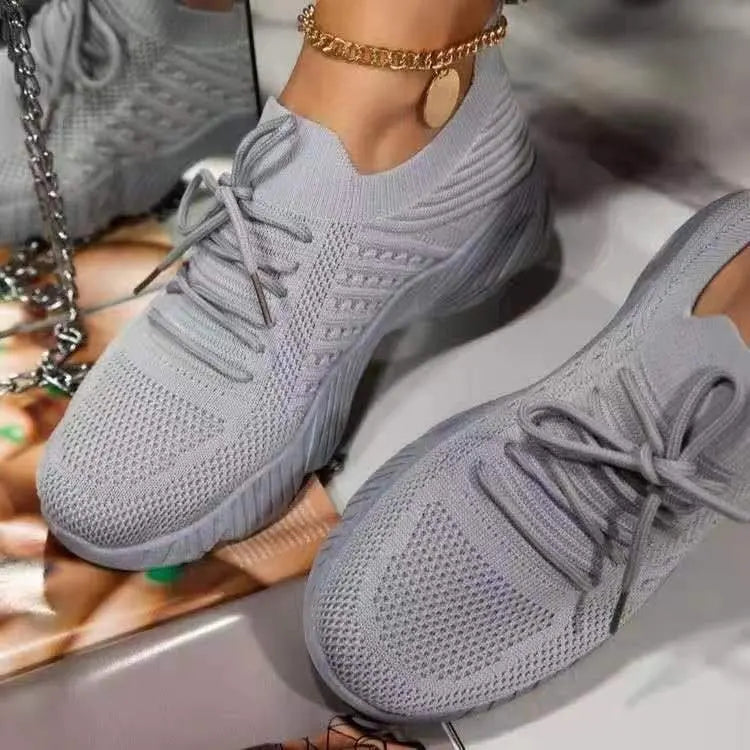 Women's knit-texture walking sneakers with lace-up fronts