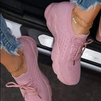 Women's knit-texture walking sneakers with lace-up fronts