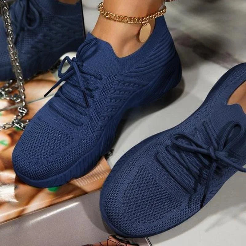Women's knit-texture walking sneakers with lace-up fronts
