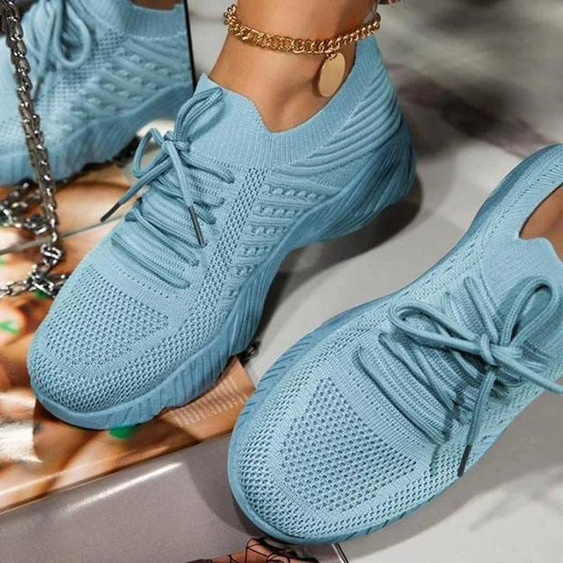 Women's knit-texture walking sneakers with lace-up fronts