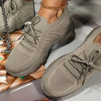 Women's knit-texture walking sneakers with lace-up fronts