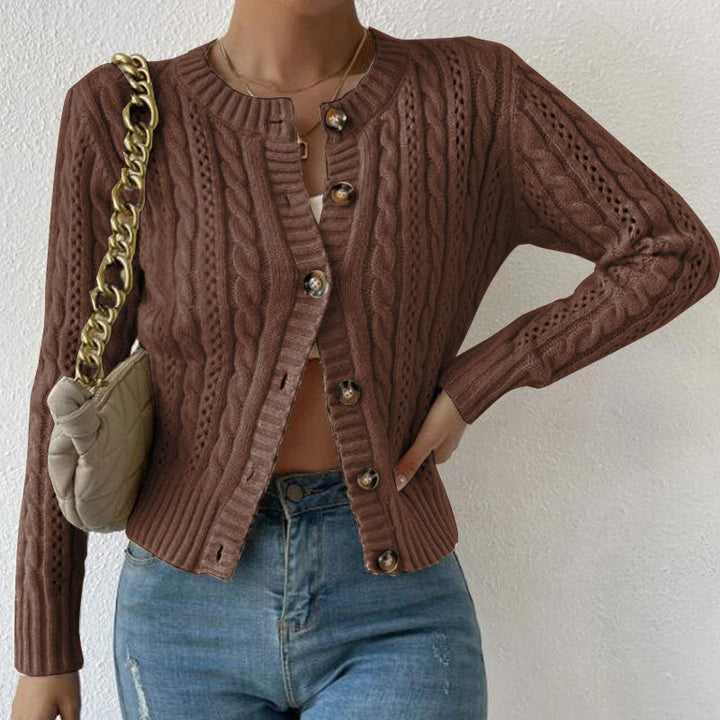Women's textured cable knit cardigan with round neck and button front