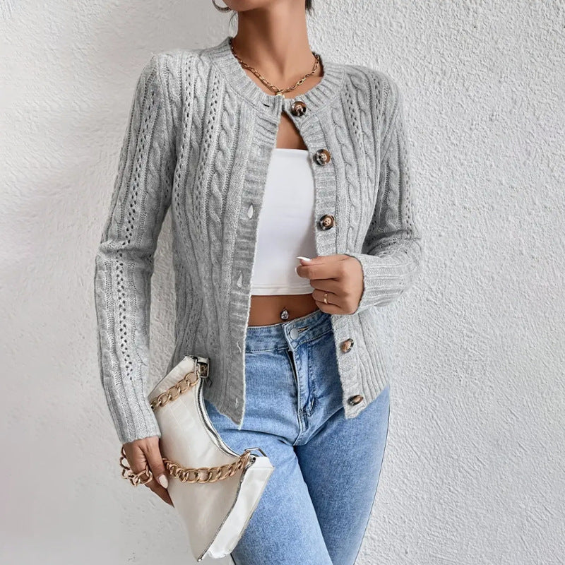 Women's textured cable knit cardigan with round neck and button front