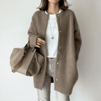 Women's longline button front cardigan with round neckline and long sleeves