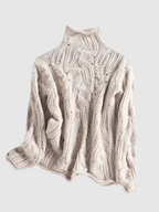 Women's textured cable knit turtleneck sweater with long sleeves