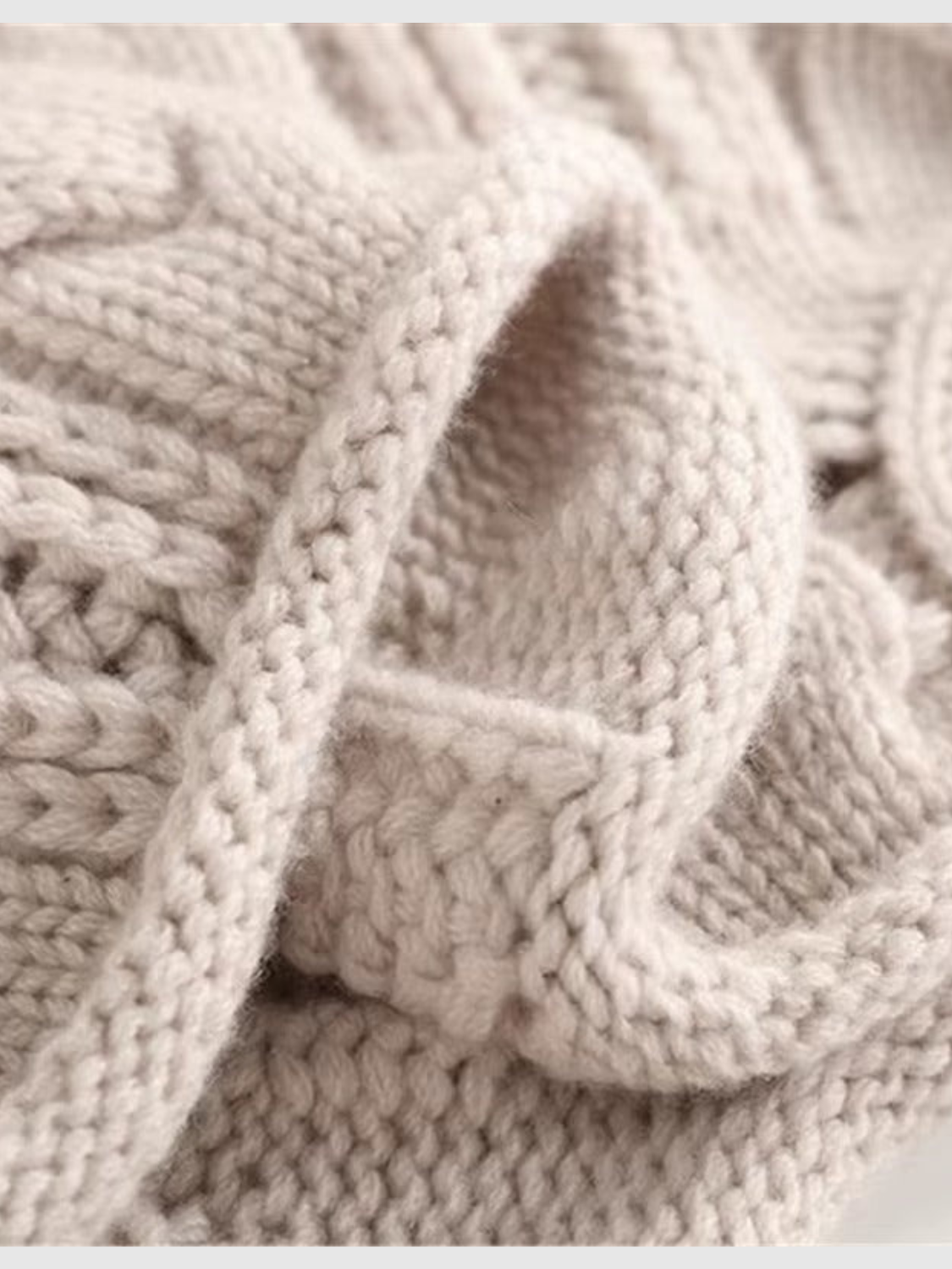 Women's textured cable knit turtleneck sweater with long sleeves