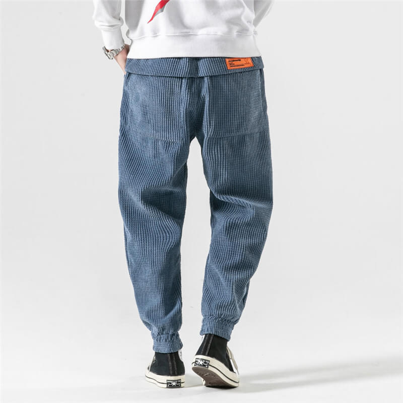 Men's ribbed corduroy jogger trousers with elasticated ankle cuffs and drawstring waist