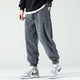 Men's ribbed corduroy jogger trousers with elasticated ankle cuffs and drawstring waist