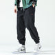 Men's ribbed corduroy jogger trousers with elasticated ankle cuffs and drawstring waist