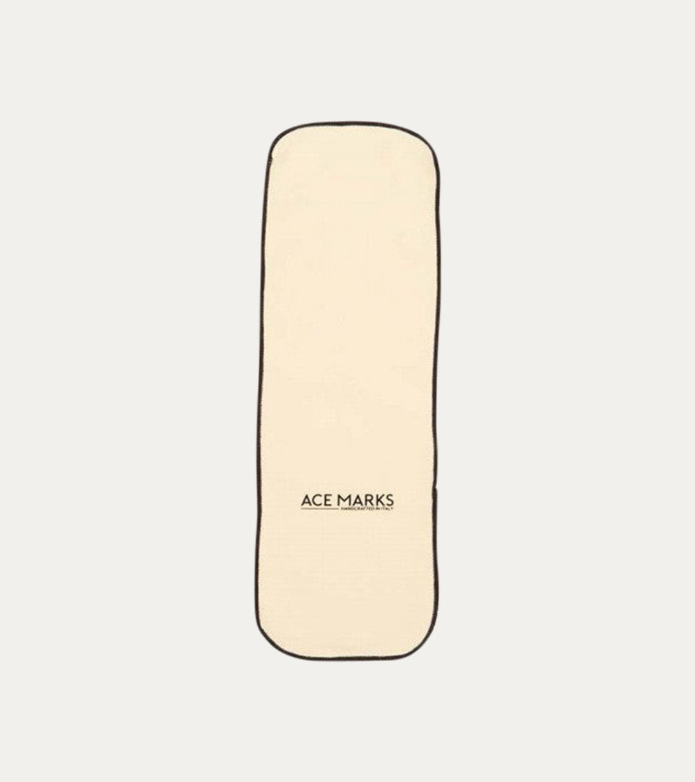 Cream rectangular polishing cloth with dark bound edges