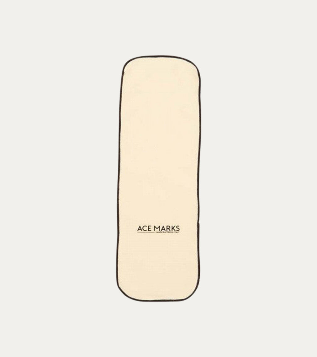 Cream rectangular polishing cloth with dark bound edges