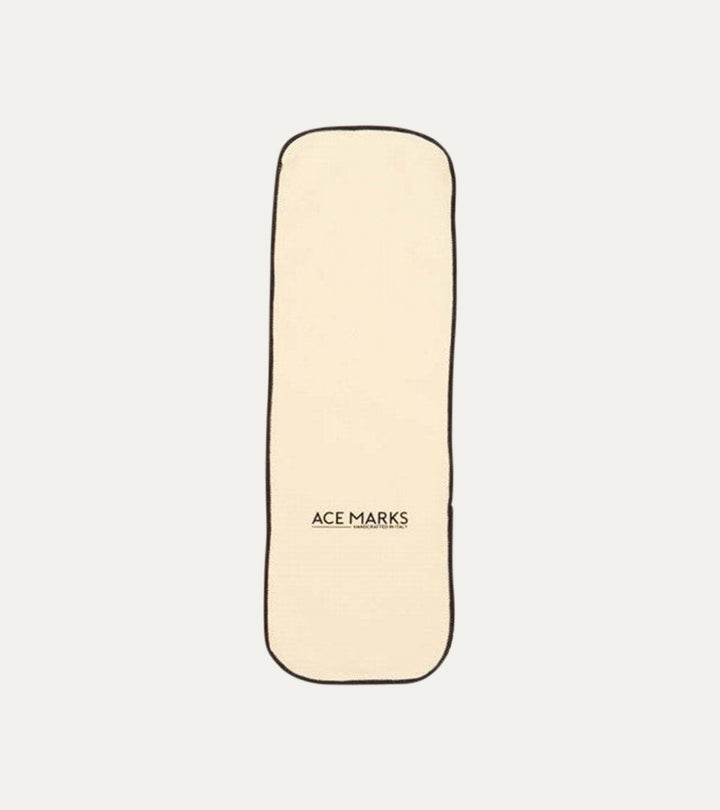 Cream rectangular polishing cloth with dark bound edges