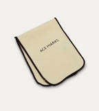 Cream rectangular polishing cloth with dark bound edges