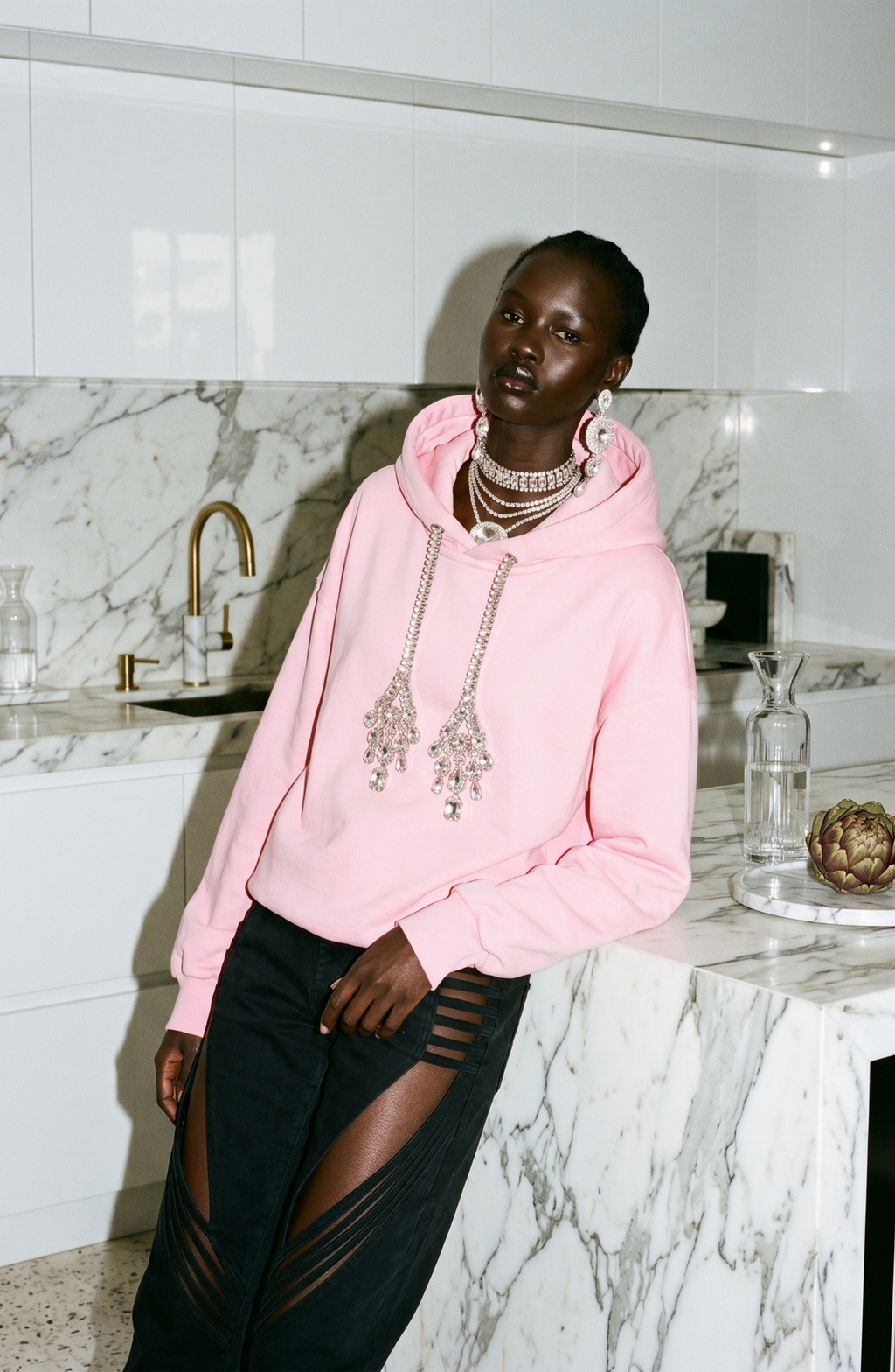 Pink hoodie with crystal embellished drawstrings and long sleeves