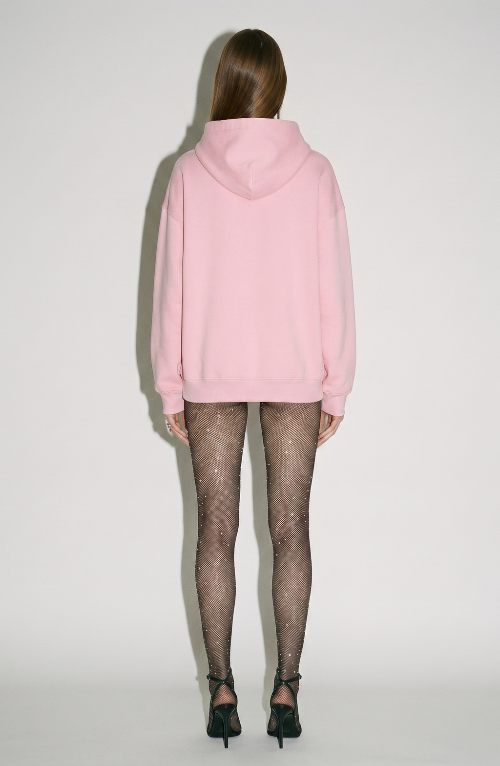 Pink hoodie with crystal embellished drawstrings and long sleeves
