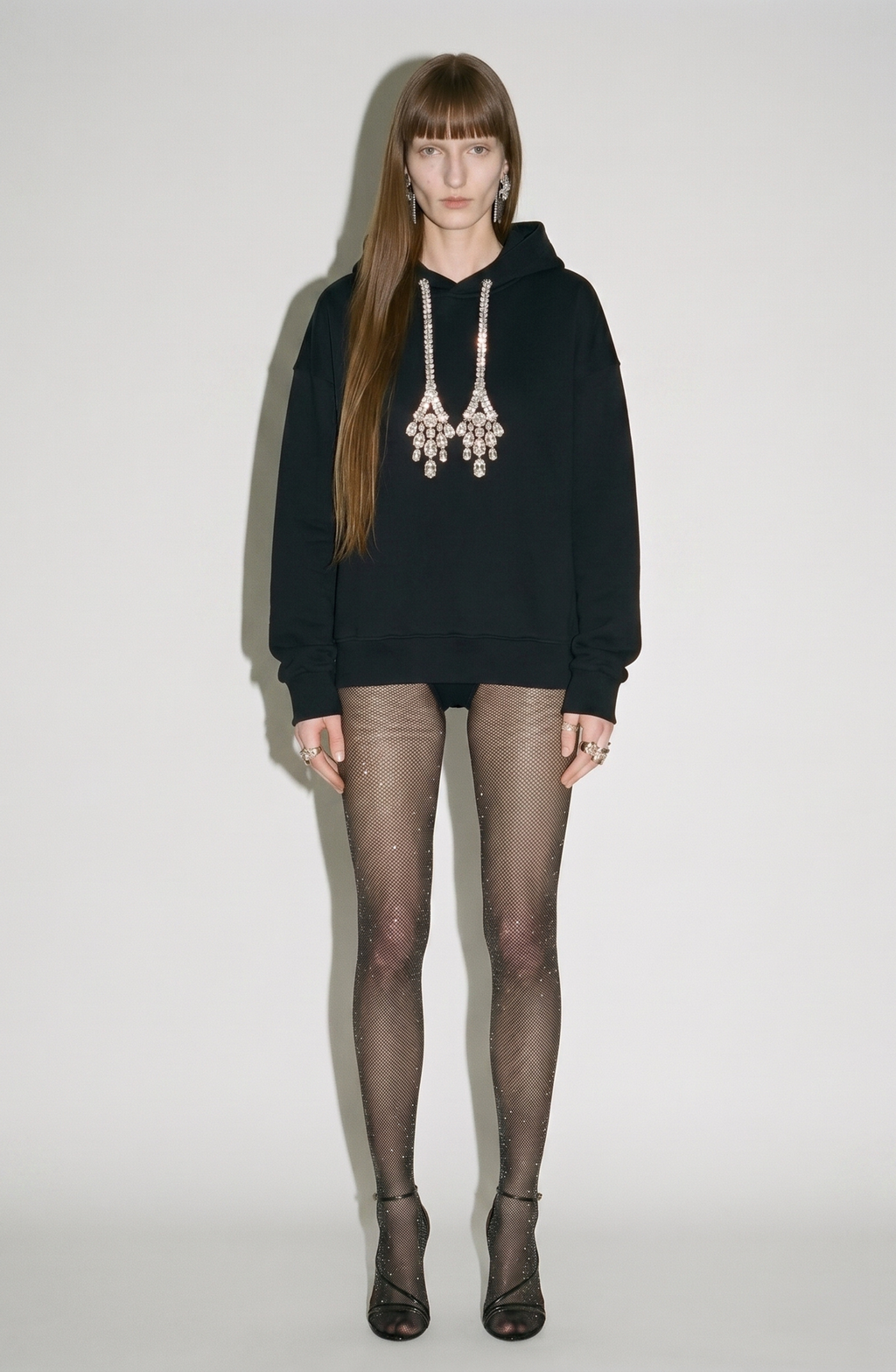 Women's black hooded sweatshirt with crystal drawstring ends and long sleeves