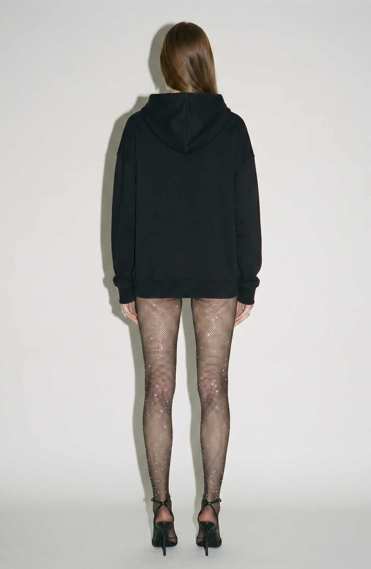Women's black hooded sweatshirt with crystal drawstring ends and long sleeves