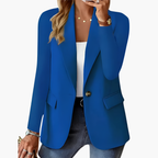 Women's tailored blazer with open lapels and flap pockets