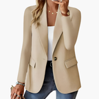 Women's tailored blazer with open lapels and flap pockets