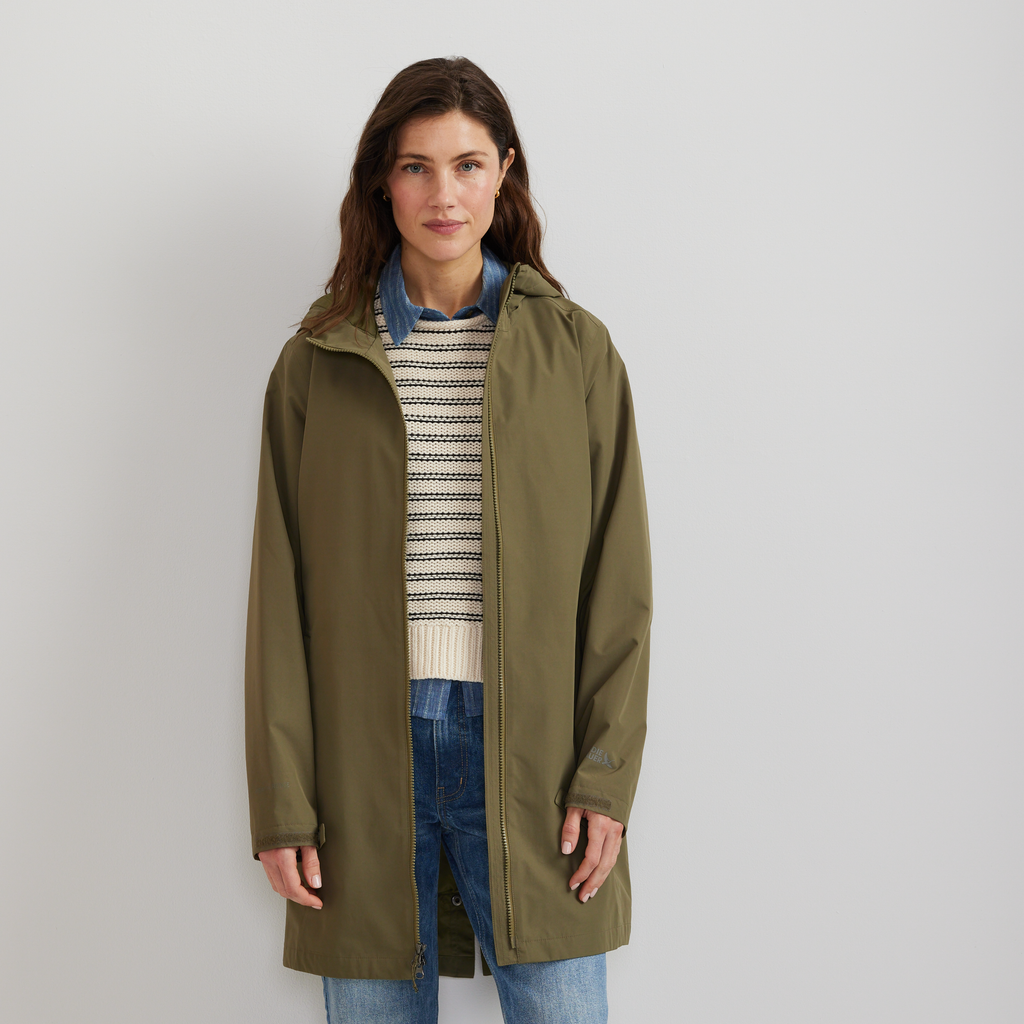 Women's hooded mid-thigh trench coat with long sleeves and zip fastening