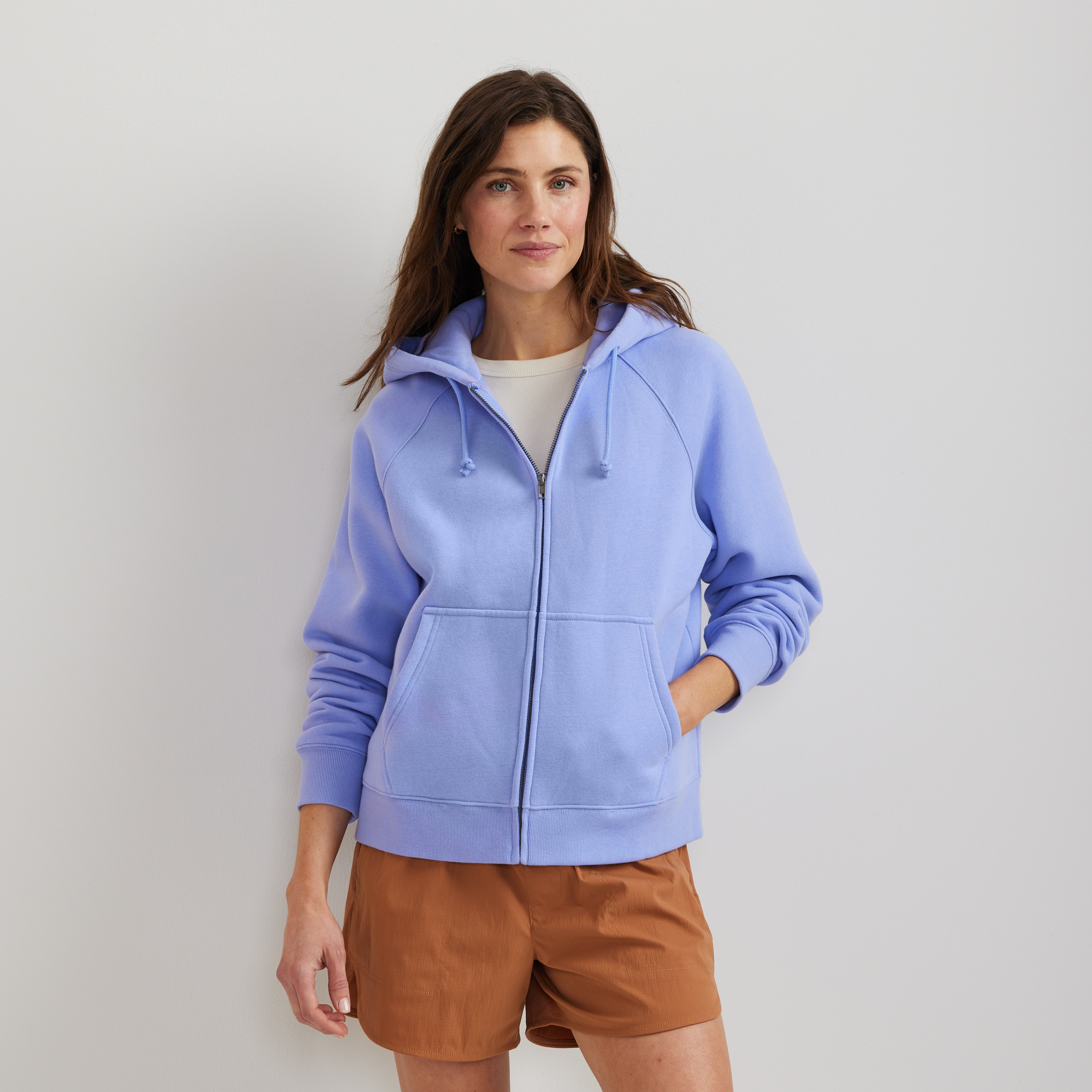 Women's full-zip hoodie with drawstring hood and front pouch pockets