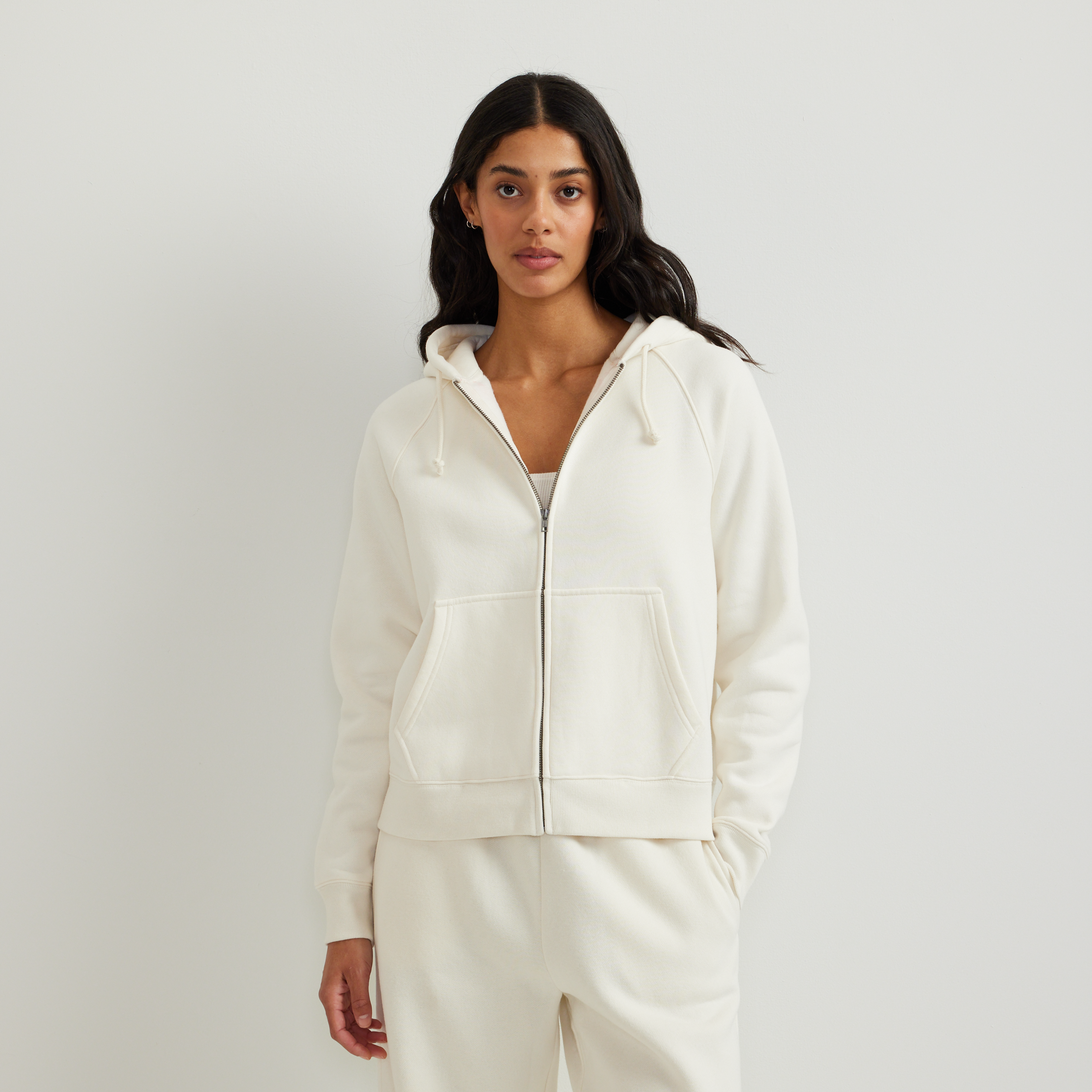 Women's full-zip hoodie with drawstring hood and front pouch pockets
