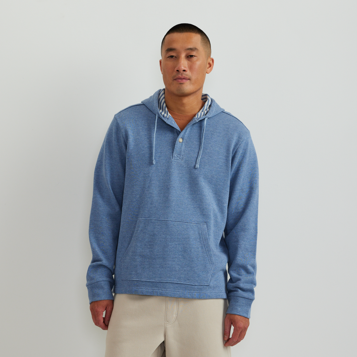 Men's striped Henley hoodie with button placket and kangaroo pocket